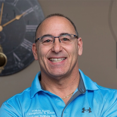 A headshot of Dr. Anthony DiMola, a chiropractor at DiMola Family Chiropractic